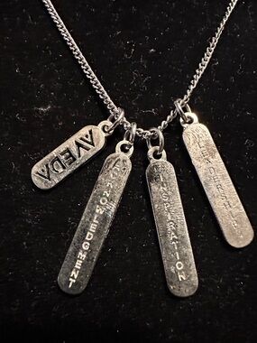 AVEDA Silver Tone Inspirational Tag Pendant Necklace